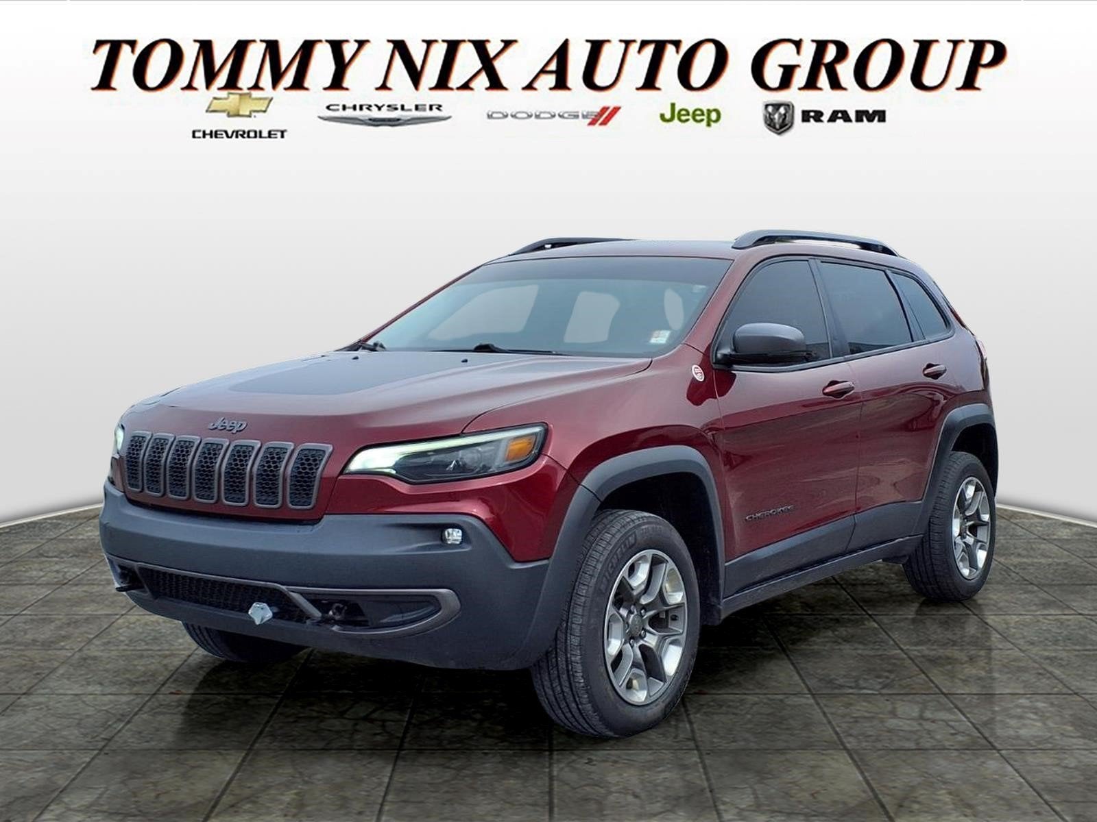 2019 Jeep Cherokee Trailhawk in Velvet Red — front three-quarter view