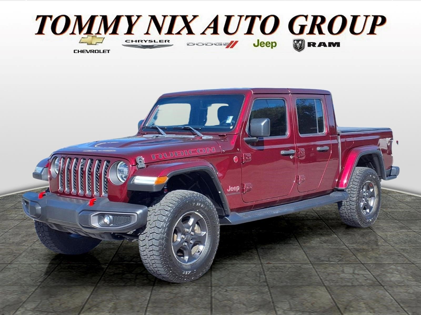 2021 Jeep Gladiator Rubicon in Snazzberry Prlc — front three-quarter view