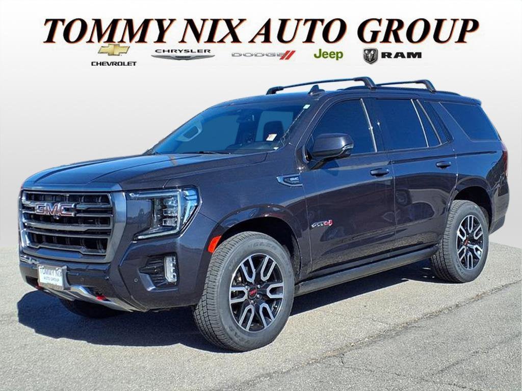 2023 GMC Yukon AT4 in Titanium Rush Metallic — front three-quarter view