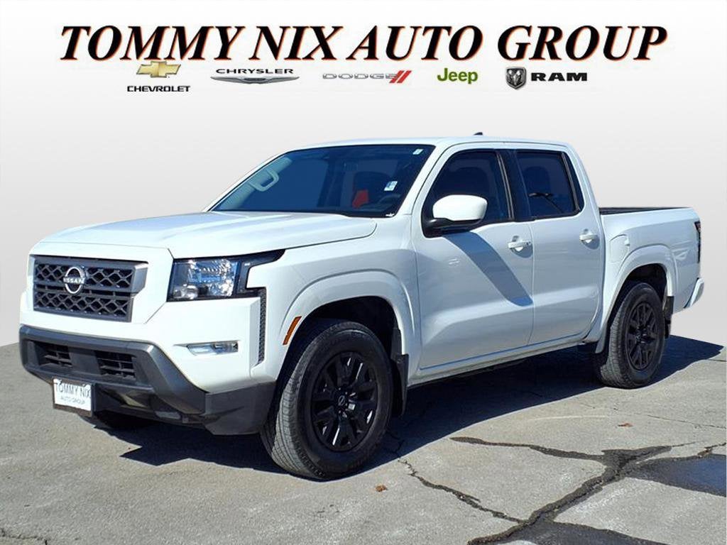 2024 Nissan Frontier SV in White — front three-quarter view