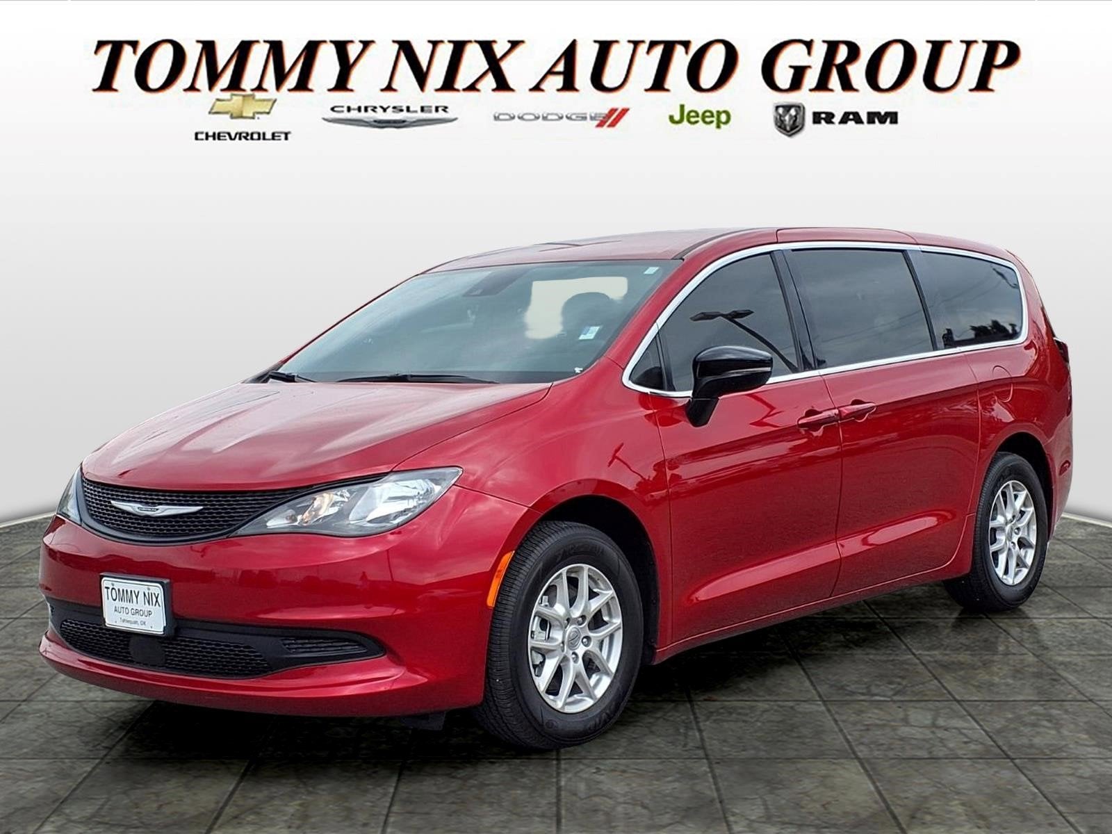 2025 Chrysler Voyager LX in Red — front three-quarter view