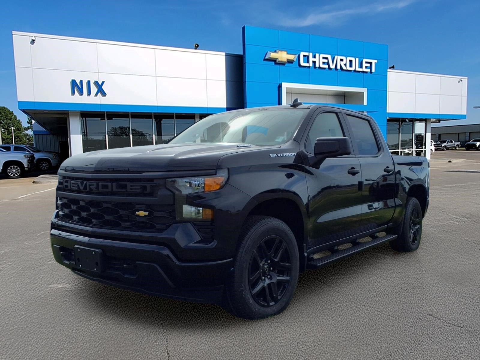 2026 Chevrolet Silverado 1500 Custom in Black — front three-quarter view