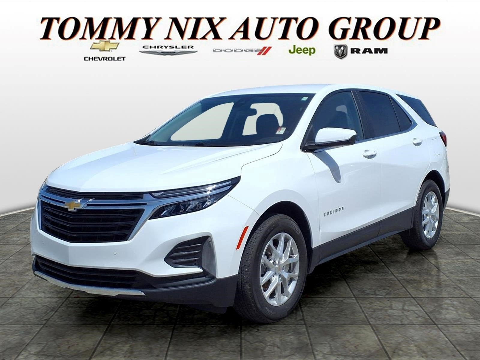 2024 Chevrolet Equinox LT in Summit White — front three-quarter view