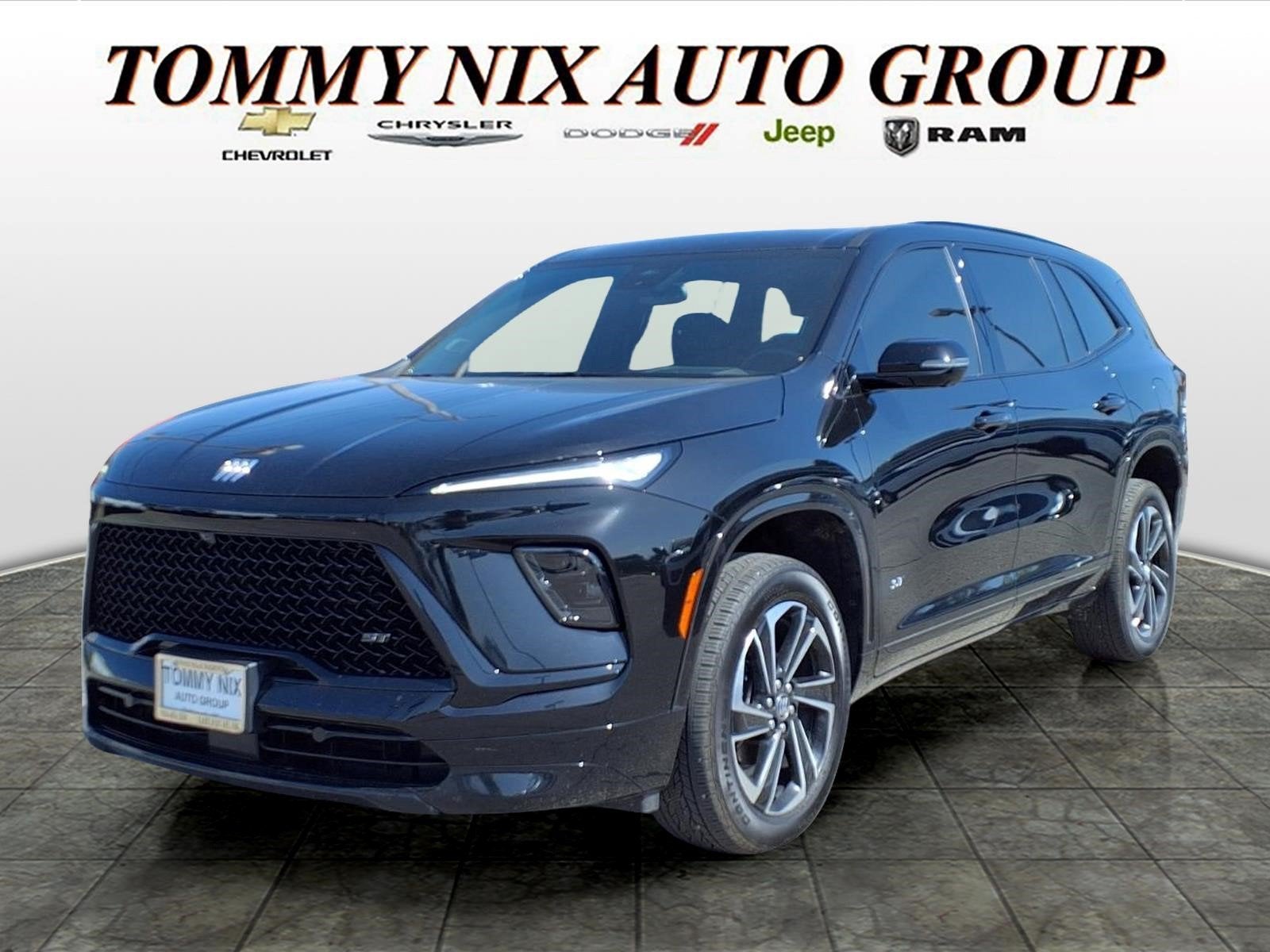 2025 Buick Enclave Sport Touring in Ebony Twilight Metallic — front three-quarter view