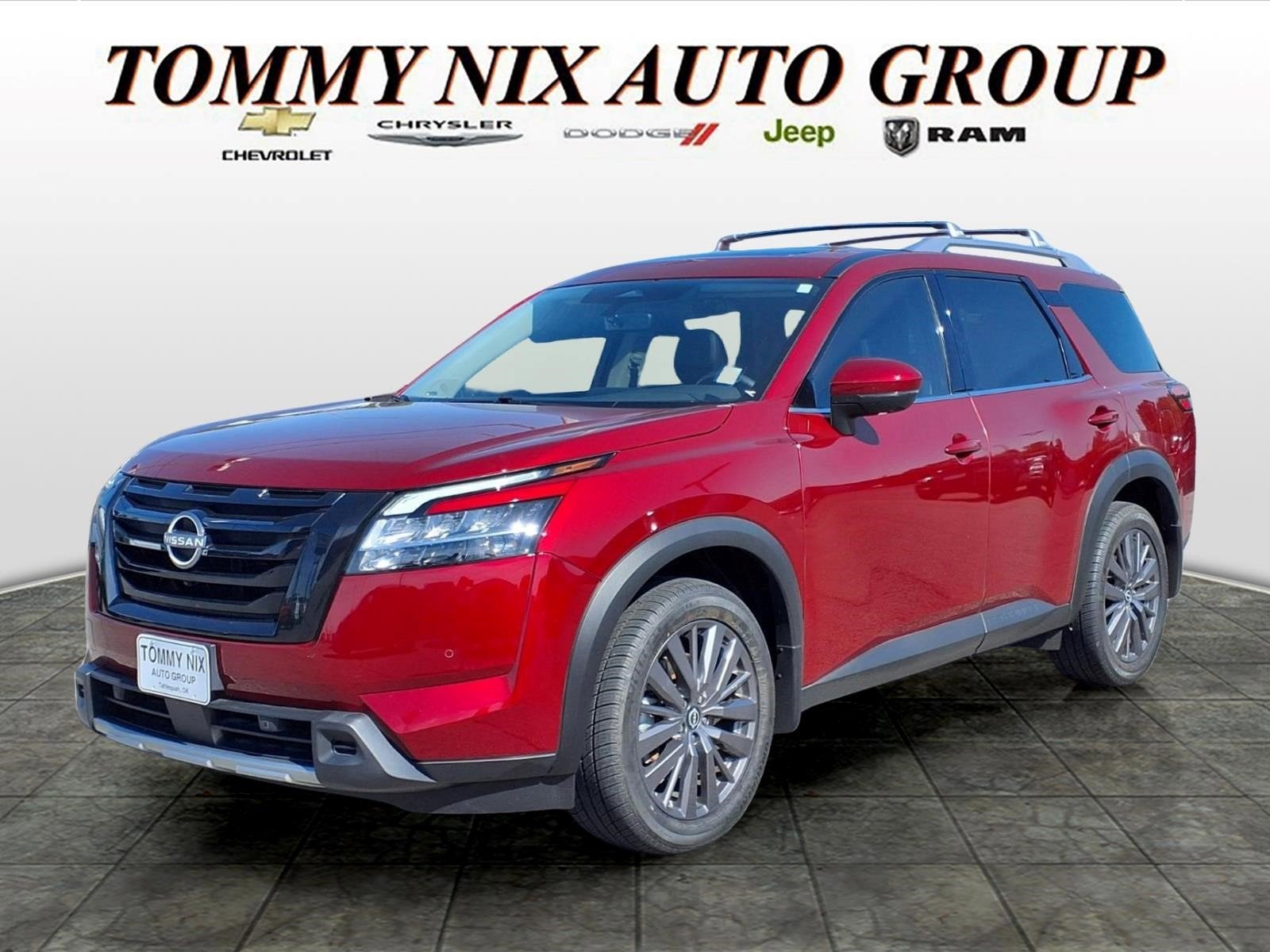 2023 Nissan Pathfinder SL in Red — front three-quarter view