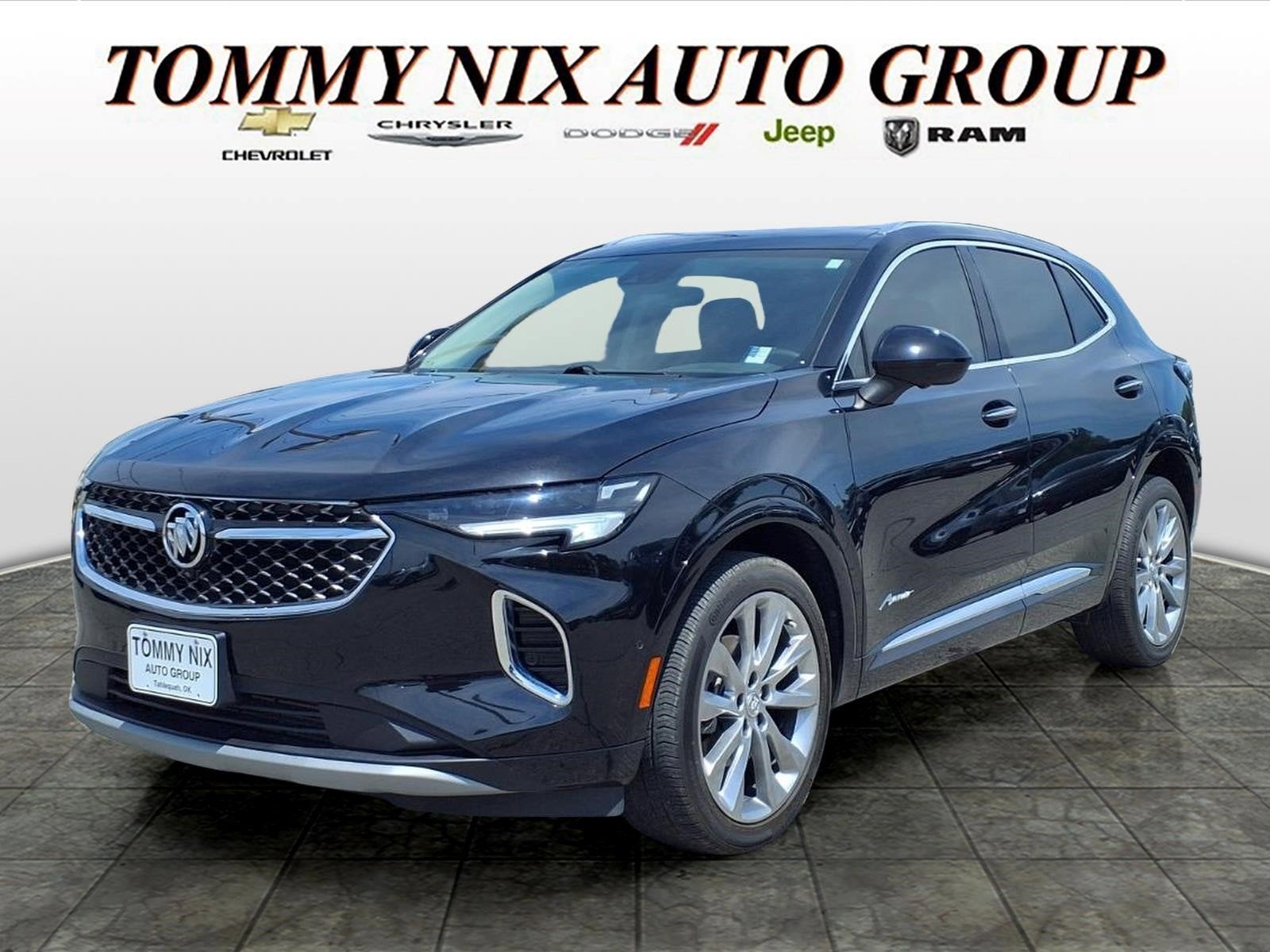2023 Buick Envision Avenir in Ebony Twilight Metallic — front three-quarter view